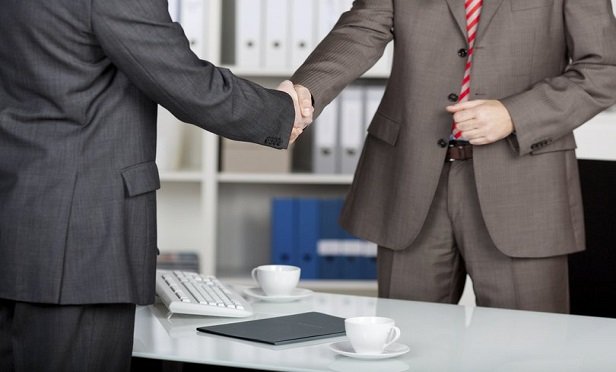 Two men shaking hands