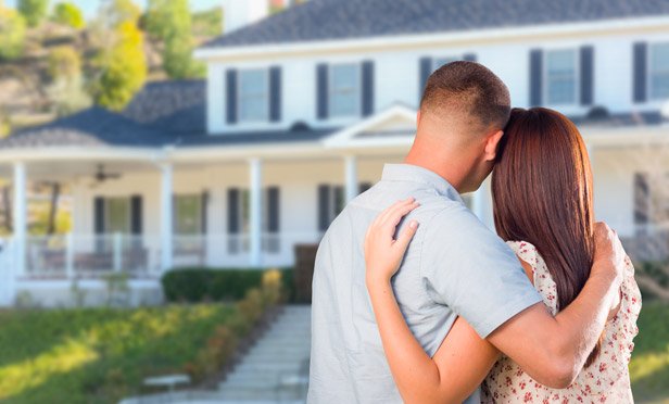 08_Young_Couple_Buying_Home_MI