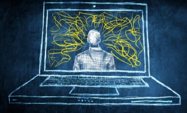 chalk drawing of man on computer screen with yellow lines coming off of him