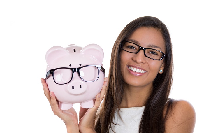 shutterstock_149340806 woman piggy bank money saving