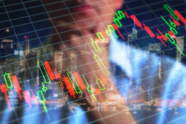 closeup of man with hand on chin collaged with investment chart
