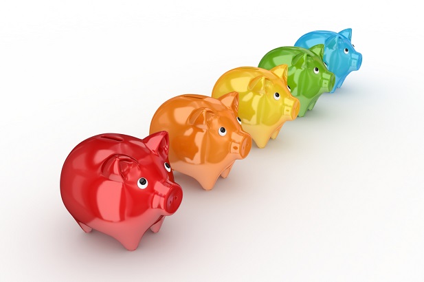 five piggy banks in rainbow of colors