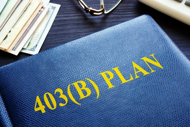 blue notebook with 403(b) Plan written in gold on cover