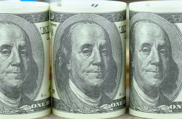 3 rolls of Ben Franklins on U.S. currency