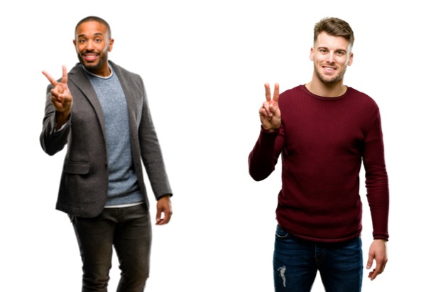 young men holding number 2