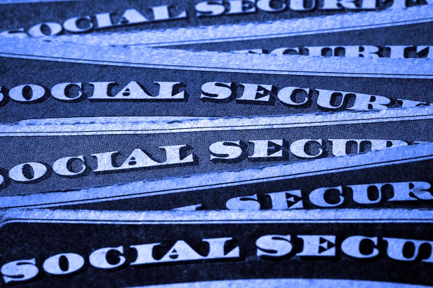 layers of blue tops of Social Security cards
