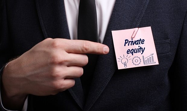 closeup of man in suit pointing at nametag Private Equity