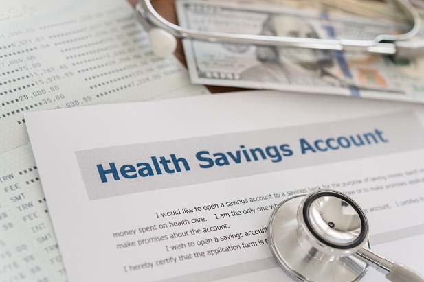 stethoscope on paper printed Health Savings Account