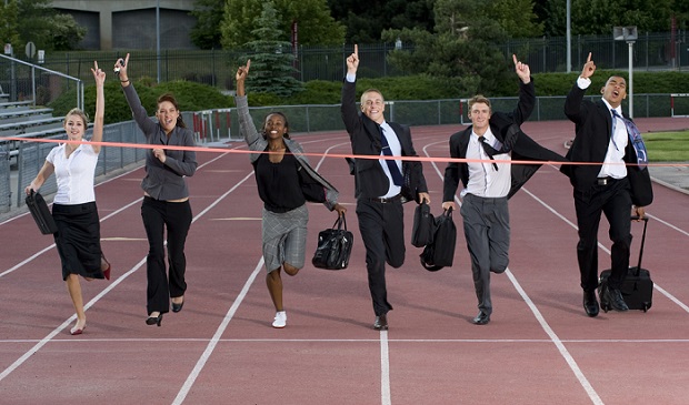 group of business people running on track with briefcases