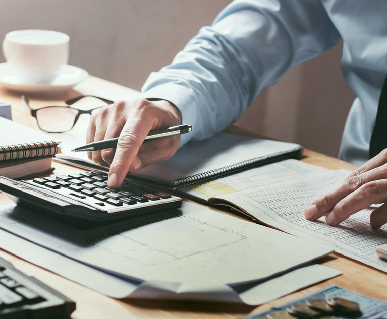 Businessman,Working,On,Desk,Office,With,Using,A,Calculator,To