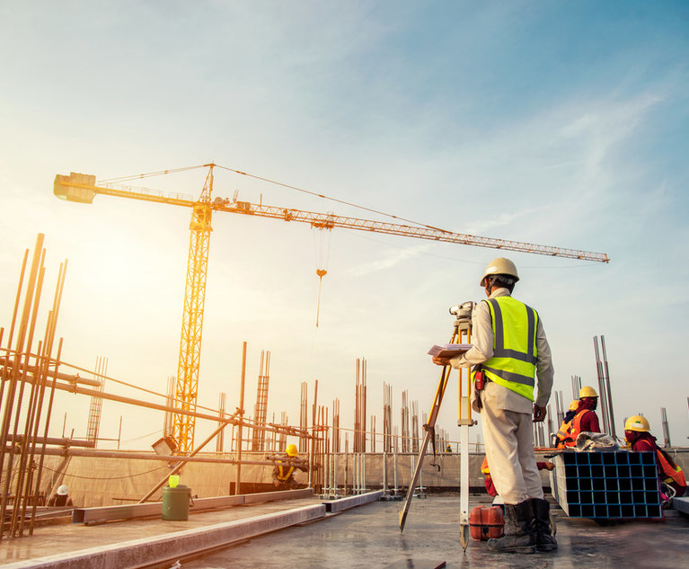 Surveyor,Builder,Engineer,With,Theodolite,Transit,Equipment,At,Construction,Site