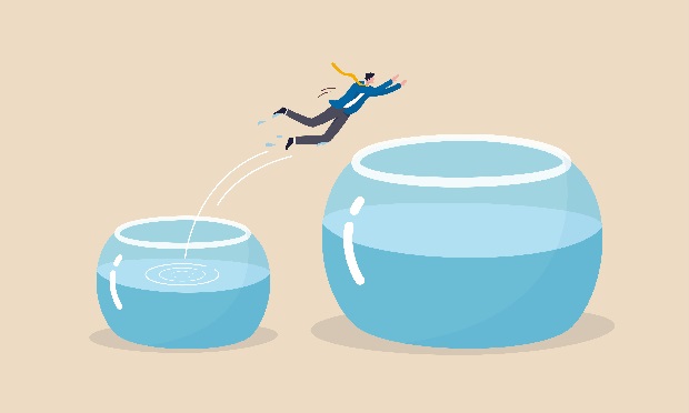 Illustration of man jumping from small fish bowl to larger