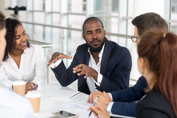 employees gathered in boardroom