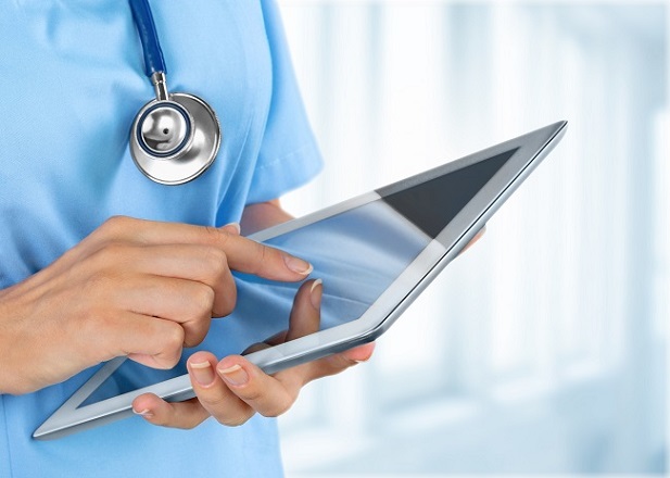 closeup of medical professional with tablet