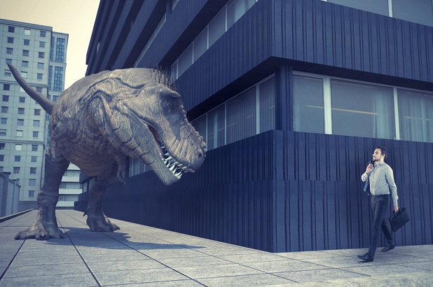 dinosaur lurks around building corner waiting to attack man