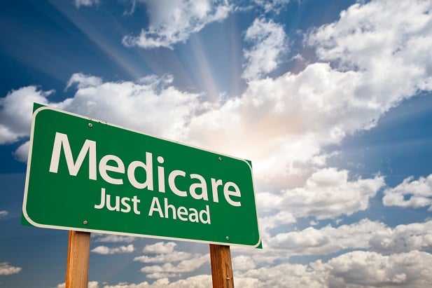 highway sign saying Medicare Just Ahead