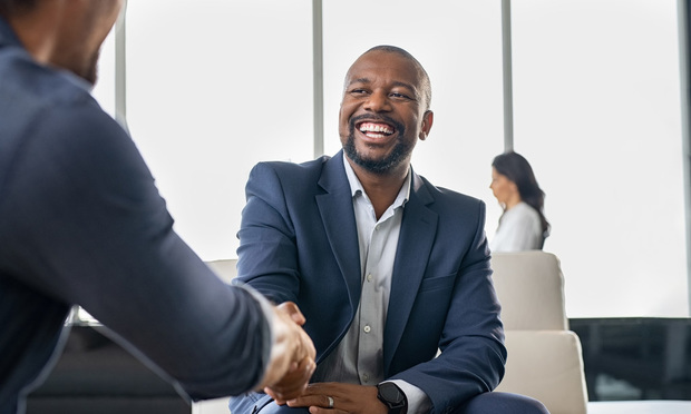 Business people shaking hands