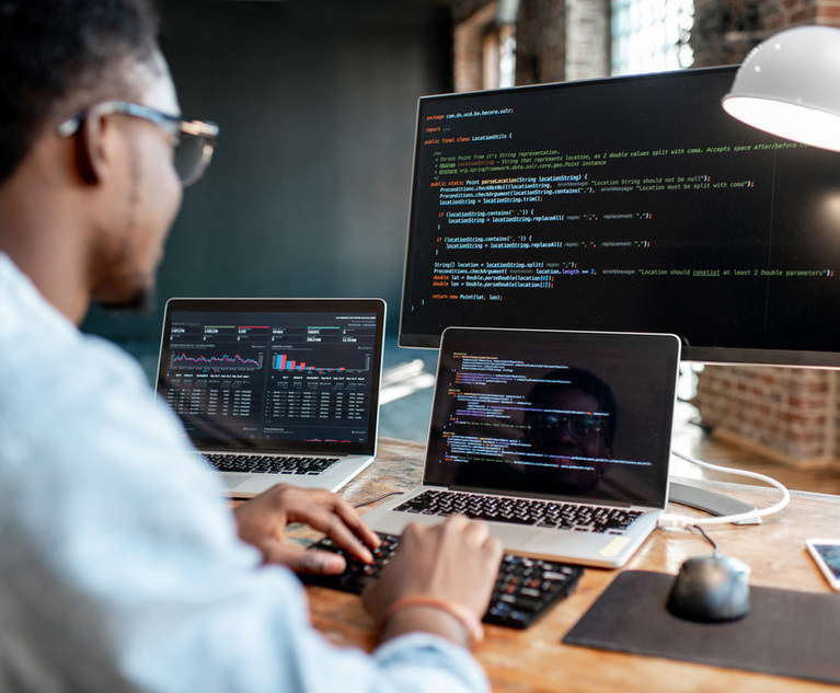 Programmer working with program code