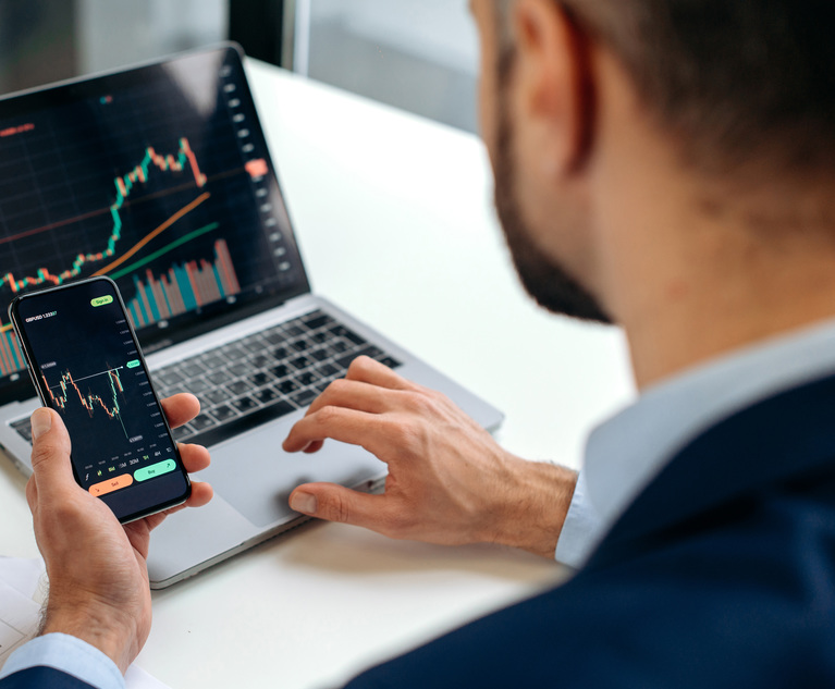 Close-up of male hands holding smartphone. Trader investor analyst using mobile phone app for cryptocurrency stock market, analyzing graph trading data index investment growth chart, plans strategy