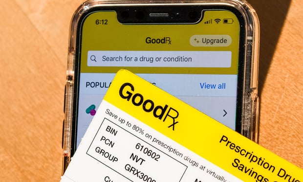 GoodRx Card and GoodRx app. Credit: Sundry Photography/Adobe Stock