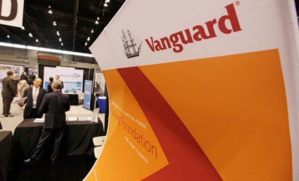 A Vanguard booth at a conference exhibit hall.