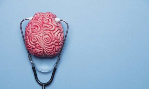 Mental health concept. human brain on a blue background.©ink drop - stock.adobe.com