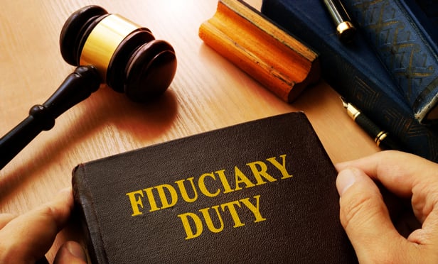 Fiuduciary duty book and gavel