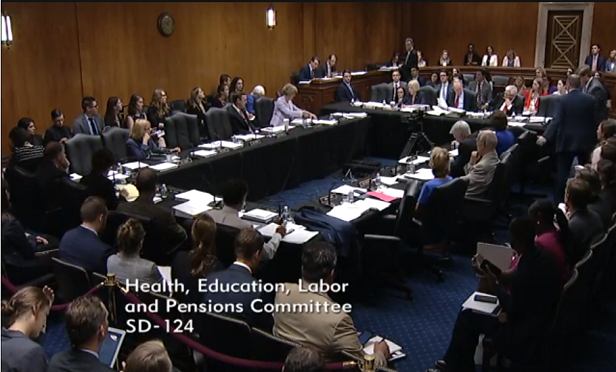 Members of the Senate HELP Committee sitting around tables set up in a rectangular formation. (Photo: Senate HELP)