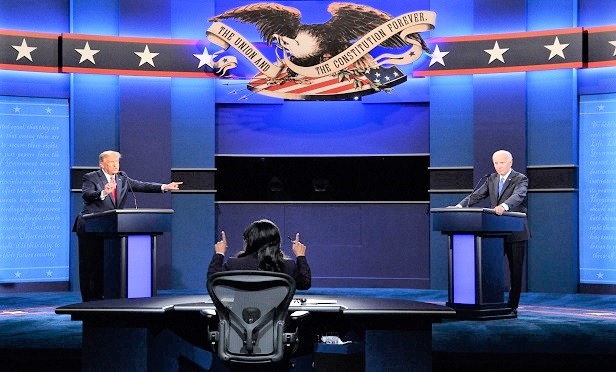 President Donald Trump speaks as Joe Biden, 2020 Democratic presidential nominee, right, listens during the U.S. presidential debate at Belmont University in Nashville, Tennessee, U.S., on Thursday, Oct. 22, 2020. Photographer: Kevin Dietsch/UPI/Bloomberg